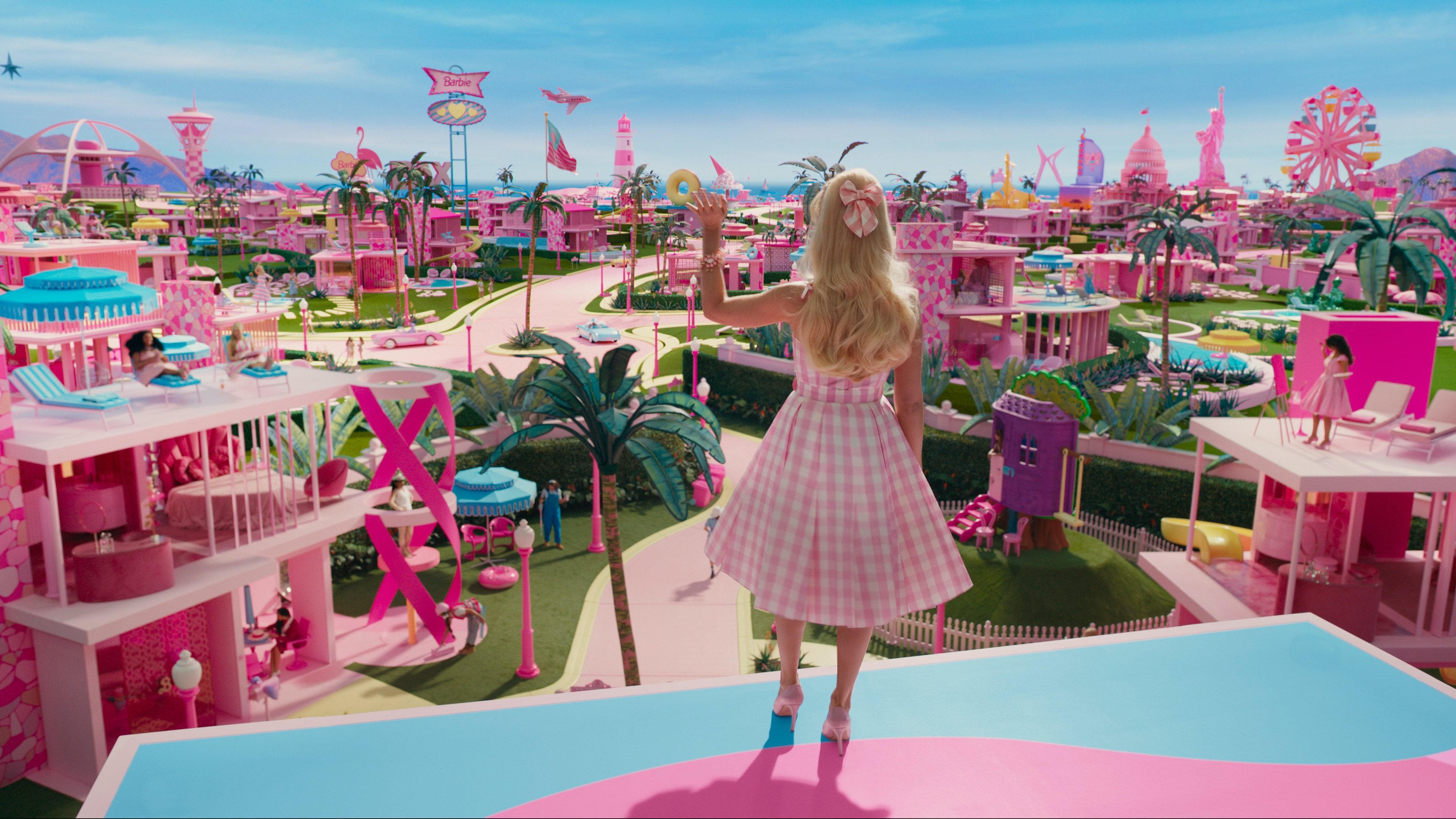 Barbie (Margot Robbie) looking out over Barbieland.