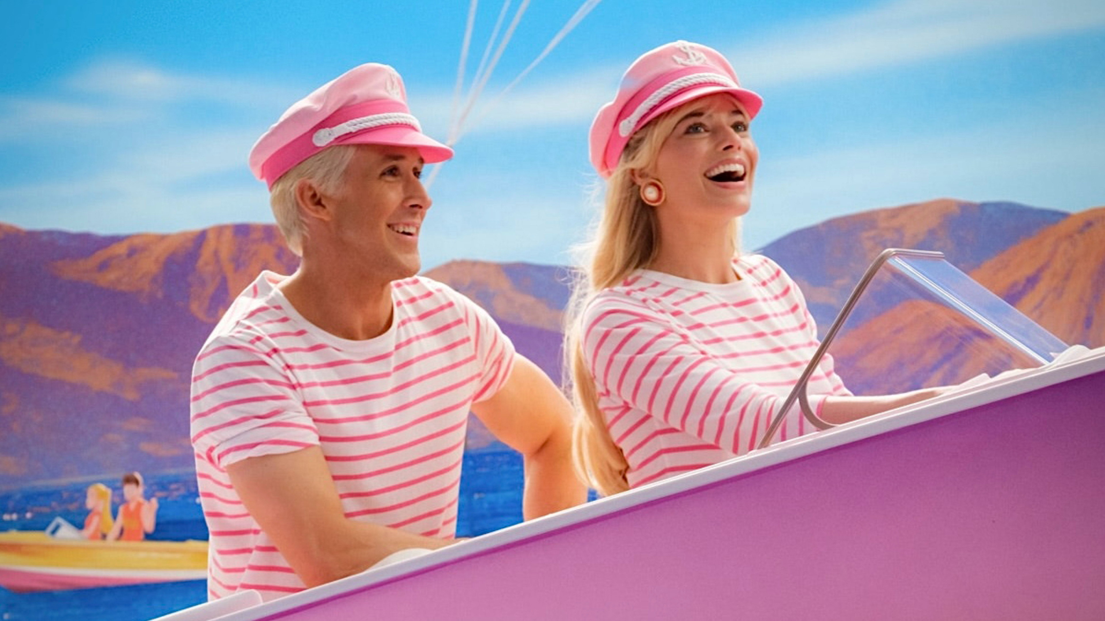 Ken and Barbie in matching stripes, out on the water.