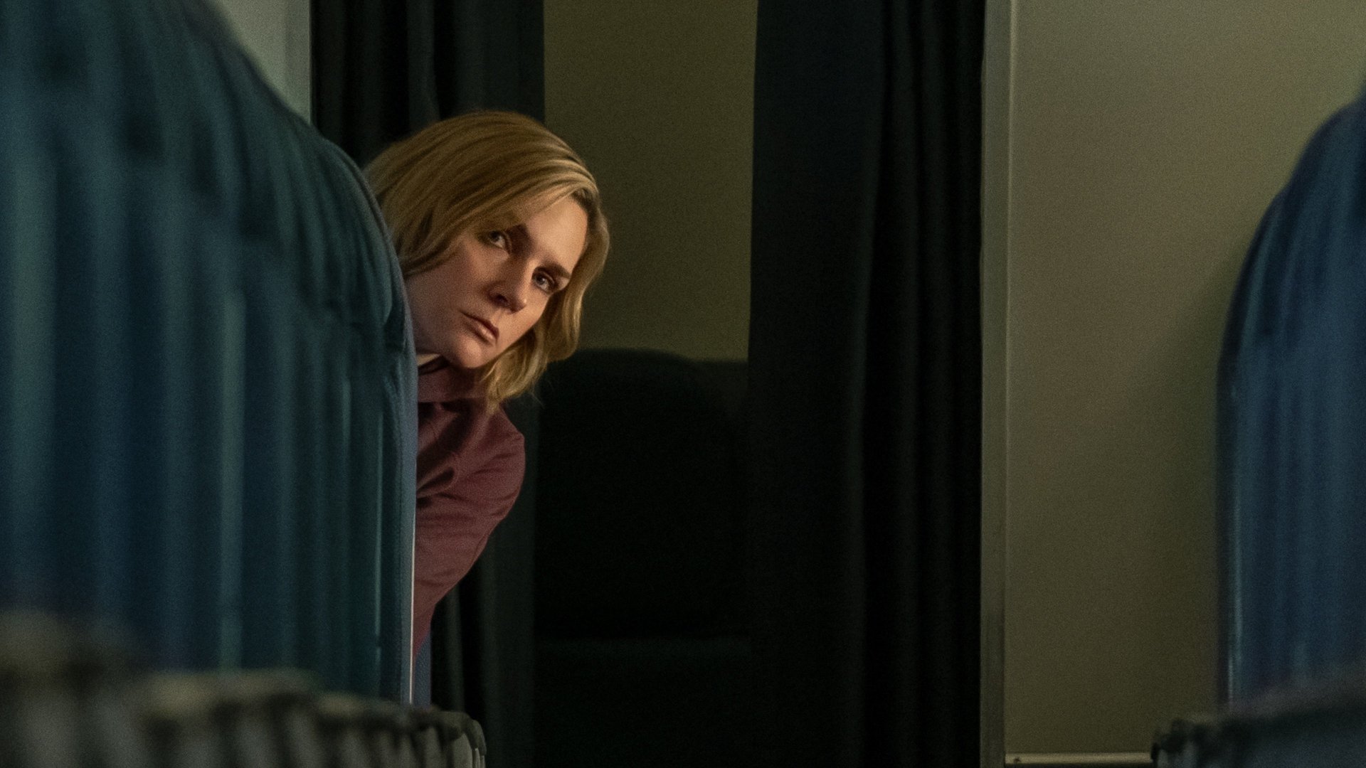 Carol (Rhea Seehorn), peeking out.